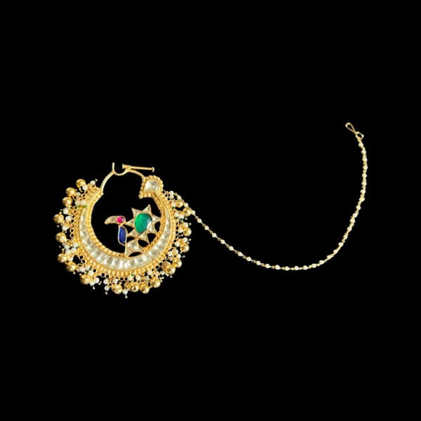 Traditional Pachi Kundan Nath With A Green Peacock Designed On It. Traditional Pachi Kundan Nath With A Green Peacock Designed On It.