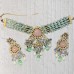 A Kundan  Monalisa Necklace set with Mint Tumbles is enough to doll up on the wedding ocassions