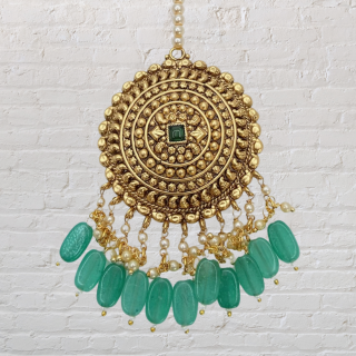 Look Ethnic By Wearing The Most Beautiful Antique  Round Maang Tikka.