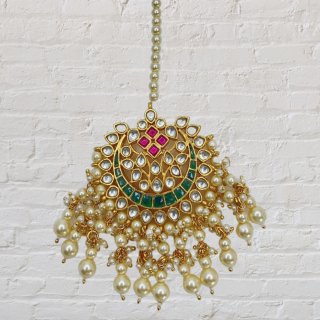 A traditional pachi kundan sober looking maang tikka Available in Two Colours