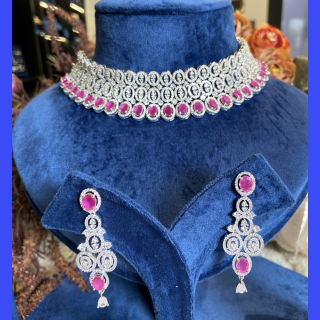 Sparkling Radiance: The American Diamond (AD) Necklace Set with Ruby Stones