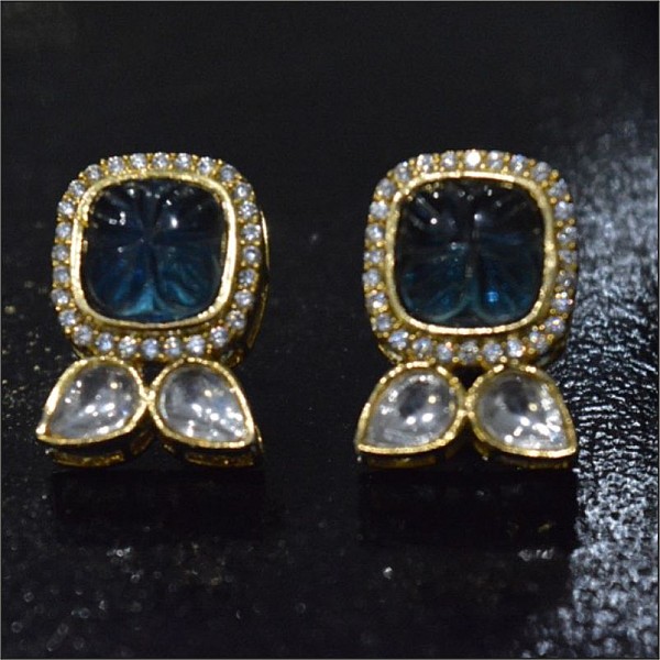 Graceful Blue Monalisa Stone Studs Circled By Zircon