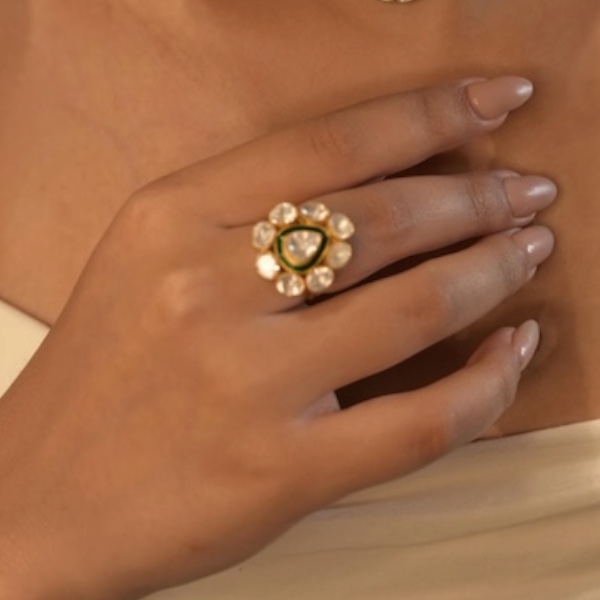 A glamorous gold-tone statement ring