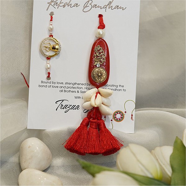 Shivaji's Trident 92.5 silver Rakhi: Red Stone Lumba with Shells and Red Tassels